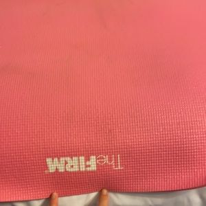 The Firm pink yoga mat